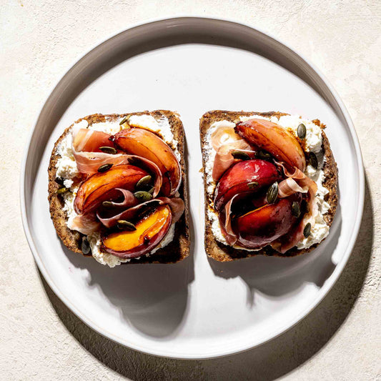 Caramelised nectarines, ricotta, pumpkin seeds and parma ham